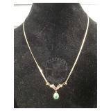 14K Gold necklace with Baguette and Round