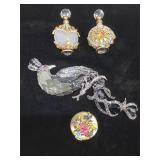 2 jeweled perfume bottles, enameled powder box,