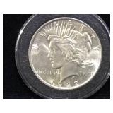 1922 Peace Silver Dollar in case