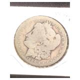 1886-O Morgan Silver Dollar in flip