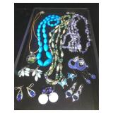 Assorted costume jewelry including necklaces and