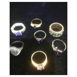 Assortment of 7 costume jewelry rings.
