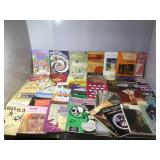 2 boxes of sheet music for the piano.