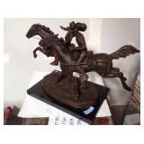 Frederick Remington, bronze , with a marble base,