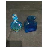 Blue Blenko bottle and a Murano bottle with