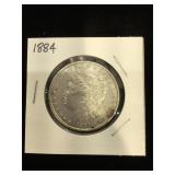 1884 Morgan Silver Dollar in flip