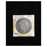 1900-O Morgan Silver Dollar in flip