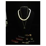 Assorted costume jewelry, pocket knives and more