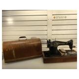 Antique singer sewing machine in carrying case