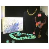 3 Necklaces, 1 earrings  in a jewelry box