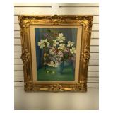 Floral painting in an ornate French frame