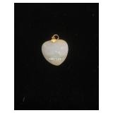 Carved and polished Jadeite pendant with 14K Gold