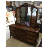 Wooden dresser w/mirror and matching headboard,