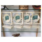 4 metal decorative stands w/shell image on it,