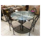 Metal dinning table w/round glass top And 4 metal