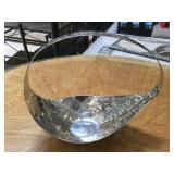Hand-hammered stainless steel basket by Alexander