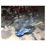 Composite dolphins coffee table w/oval glass top,