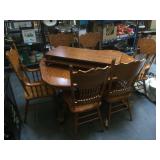 Wooden oval dining table w/Leafs and 6 chairs,