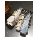 3 golf bags w/assorted clubs