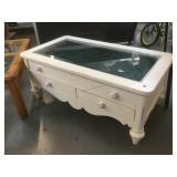 White coffee table w/drawers and glass top,