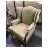 Green armchair w/wooden legs