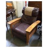 Leather armchair w/ wooden arms, has some damage