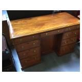 Vintage wooden desk w/brass hardware, approx