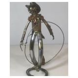 Metal cowboy sculpture, approx 9x5x16 inches