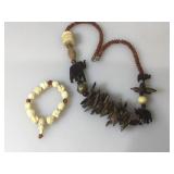 Carved wood and beaded necklace and carved bone