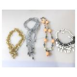 4 costume jewelry necklaces