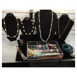 Tray of Costume jewelry, chop sticks, bone