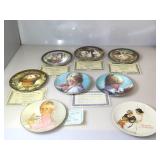 Group of collector plates in original boxes