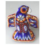 Native American Hand Beaded Bird. Some beads are