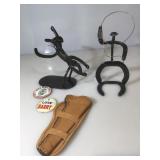 Two handmade horseshoe cowboy sculptures 11 and