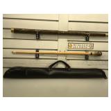 Pool cue with hand carved details and weighted