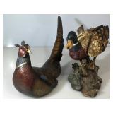 Two resin bird statues. Duck approx 12x 16 and
