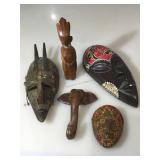 Tribal masks and other assorted items. Largest