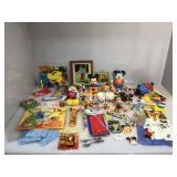 This lot is filled with Disney toys and games.