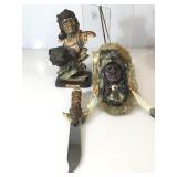 A small collection of resin American Indian