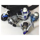 Lot of fishing reels in Zippered Bag. Approx