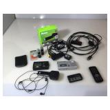 Lot of small electronics including Rokus, Korg