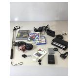 Assorted lot of electronics and video games.