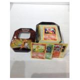 350 count lot of Mint Pokémon cards with tin