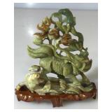 Carved oriental  Jadeite sculpture on wooden