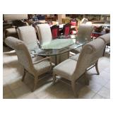 Oval glass top dinning gable w/6 chairs, approx