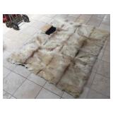 Alpaca hide rug, needs some repair, approx 70x55