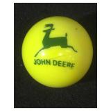 25 MM marble, yellow, displaying John Deere