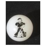 25 MM marble, white, displaying Cracker Jack