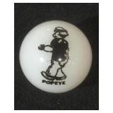 25 MM marble, white, displaying Popeye