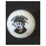 25 MM marble, white, displaying Little Orphan